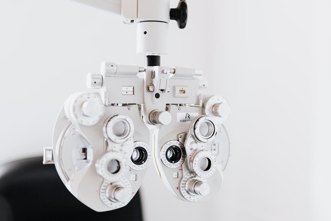 Close-up of a phoropter, an essential tool in eye examinations, used by optometrists.
